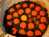 Charcoals surround the matcha bowls in the kiln to make the FU pattern